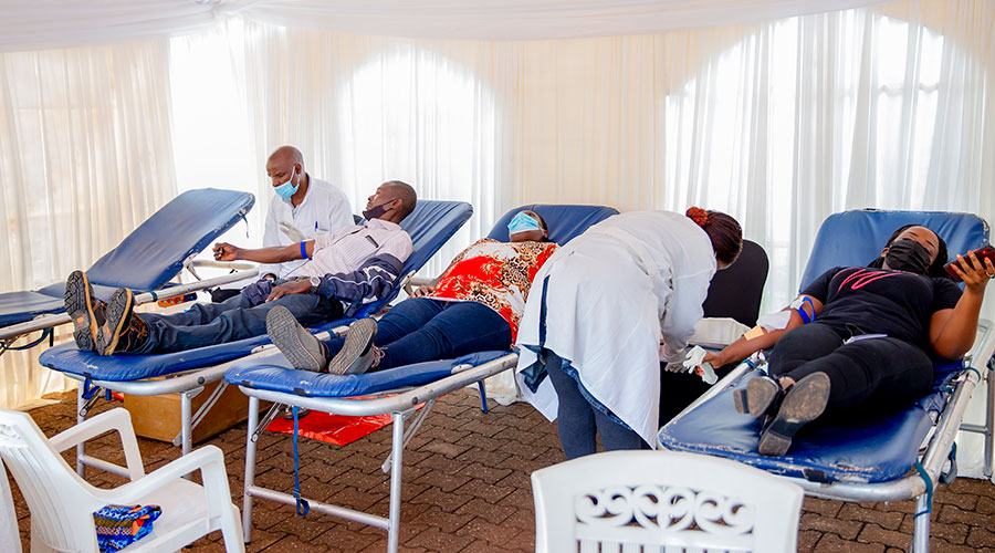 Volunteers donate blood during the 3-day Blood Collection Camp at RBCu2019s Blood Transfusion Division opposite Kigali Serena Hotel. 