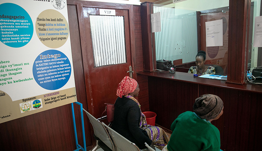 Women wait to make transactions at Kacyiru SACCO in 2019. / Photo: Sam Ngendahimana.
