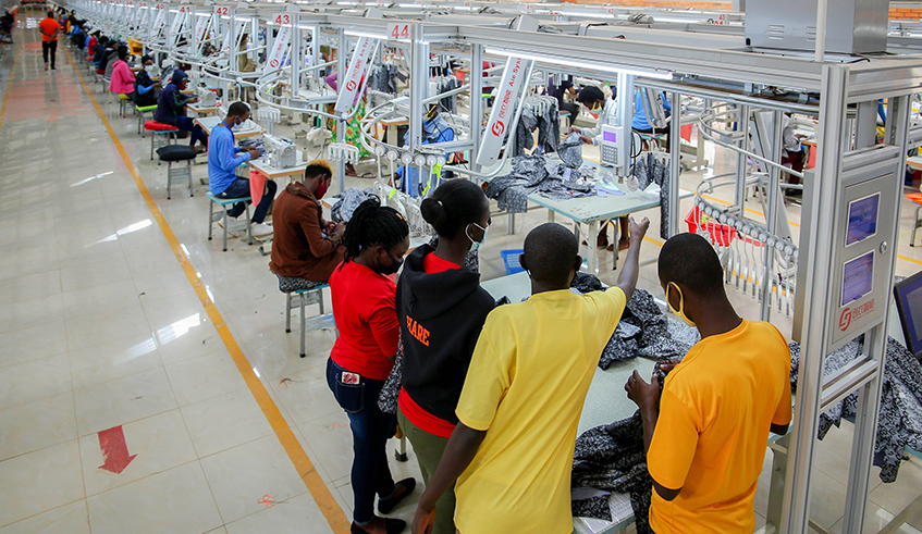 Workers at Pink Mango garment factory at the Kigali Special Economic Zone in Gasabo District. / Photo: Dan Nsengiyumva.