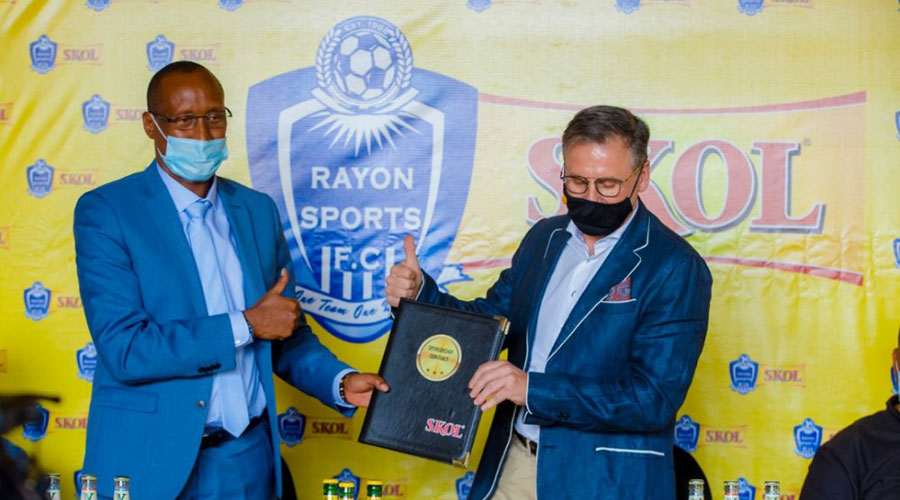 Rayon Sports President, Jean-Fidu00e8le Uwayezu, and Skol General Manager Ivan Wulffaert after signing the new deal in Kigali on Thursday, March 25. 