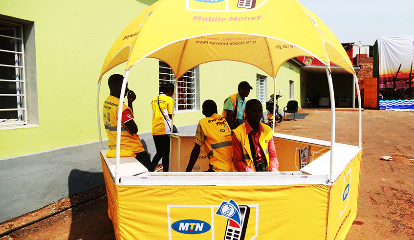 MTN mobile money agents wait for the clients in Kigali. / Sam Ngendahimana