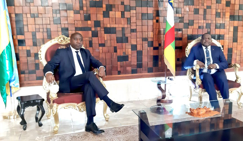 Prime Minister Ngirente with his CAR counterpart Firmin Ngru00e9bada in Bangui on March 30, 2021. The Premier represented President Paul Kagame at the swearing-in ceremony of Touadu00e9ra.