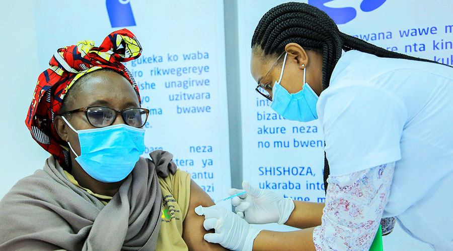 A woman receives a Covid-19 vaccination dose at Masaka Hospital on March 5. 