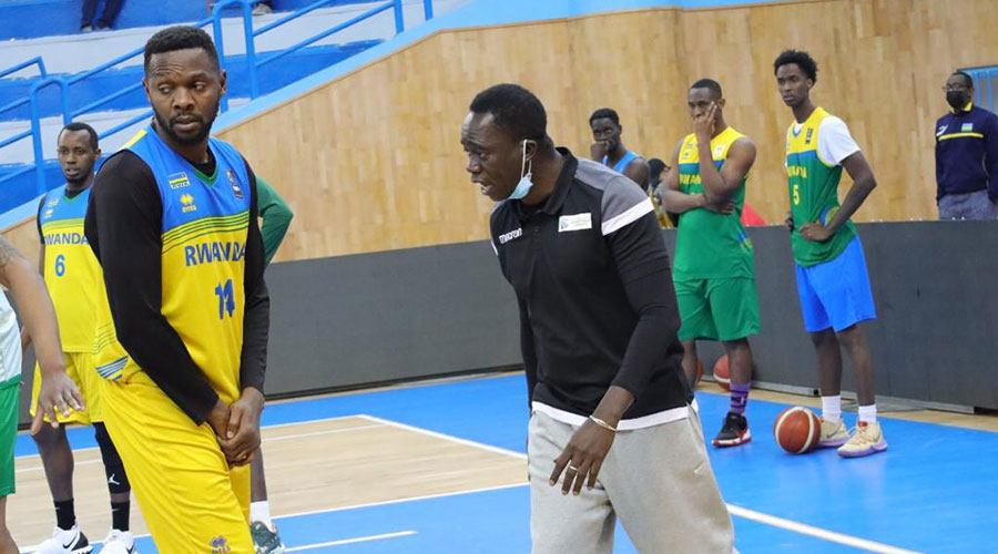 Senegalese coach Cheikh Sarr talks to national team players during a training session in Tunisia in February. The Senegalese coach is in the country to take over as coach for the national men and women basketball teams. 