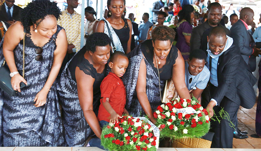 Families of victims lay wreaths at Nyanza-Kicukiro Genocide Memorial in 2019. / Photo: Sam Ngendahimana.