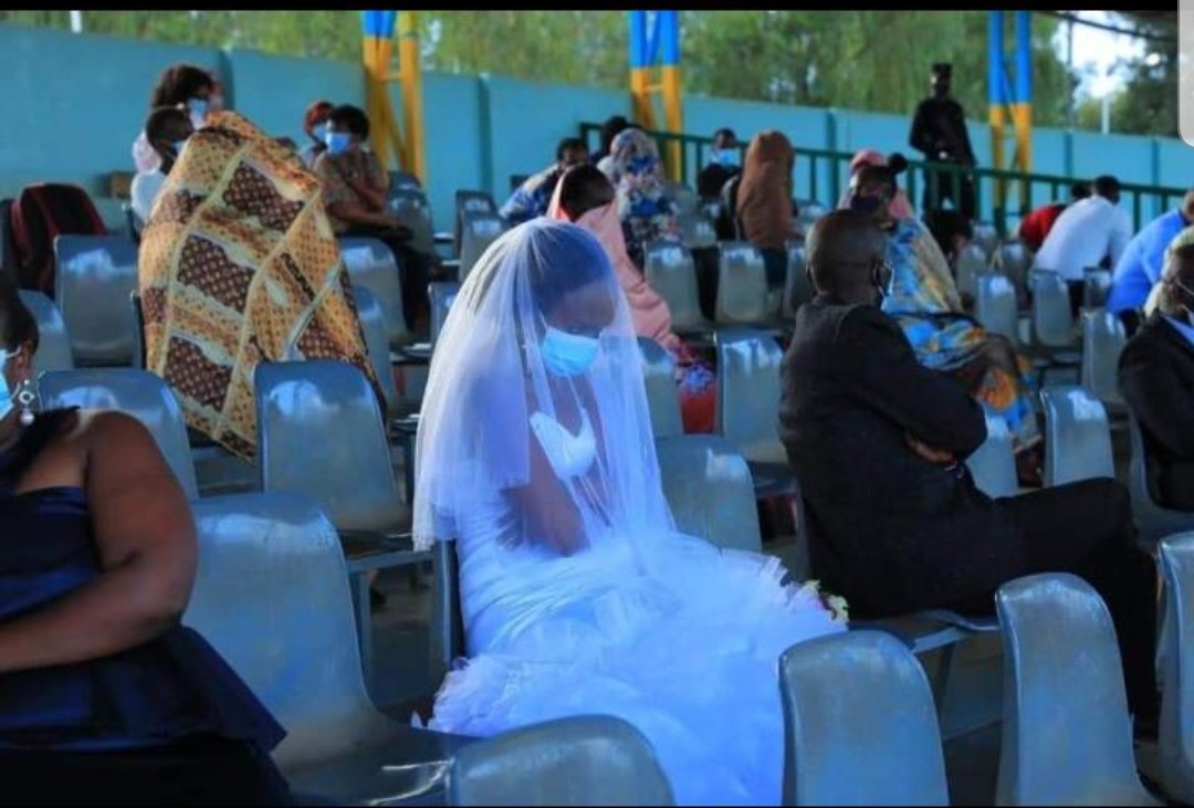 The bride and groom and their entourage on the terraces of IPRC-Kicukiro stadium after they were arrested in a sting operation over violation of Covid-19 guidelines on Monday, April 5. 
