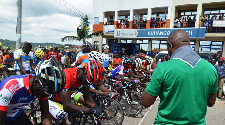Local riders observe a minute of silence to honour victims of the Genocide against the Tutsi  during  the Race To Remember cycling competition from Ruhango to Karongi recently. 
