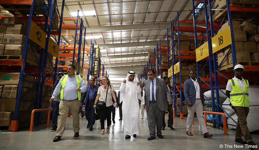 Mohammed Al Kamali the Deputy CEO of Dubai Exports (centre) and Carlos Salim Al Hashim, Vice President for Arab Union of Land Transport (3rd right) during a tour of Dubai Port World (DP World) in Masaka Sector, Kicukiro district in 2019. New tax rules, or amending existing rules can be used to attract investment. / Photo: File.