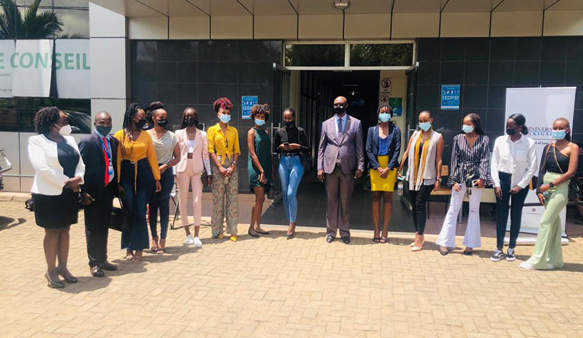 The Miss Rwanda 2021 finalists with Prof. Gustave Tombola at the University's premises . / Courtesy photos 