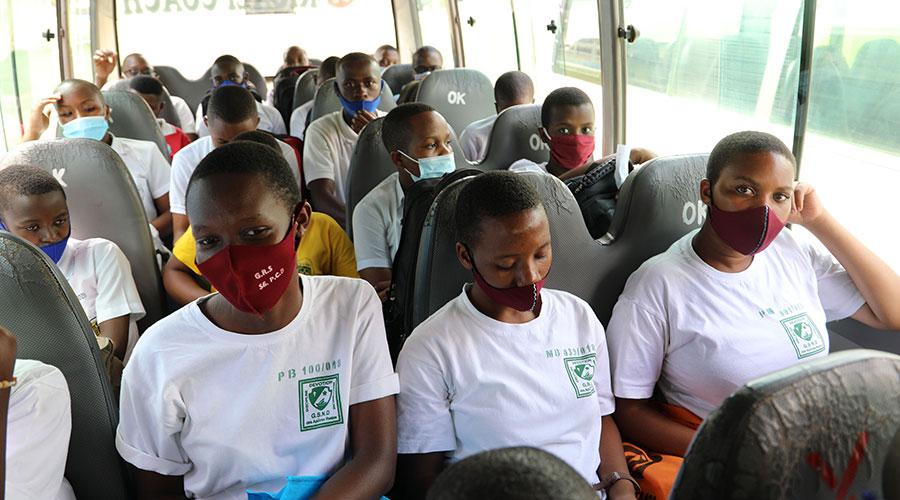 Students after boarding a bus at Kigali Stadium in Nyamirambo to head to their respective schools on Thursday, April 15. According to officials, over 80,000 students were expected to head to school in the Thursday shift but only a few commuted. 