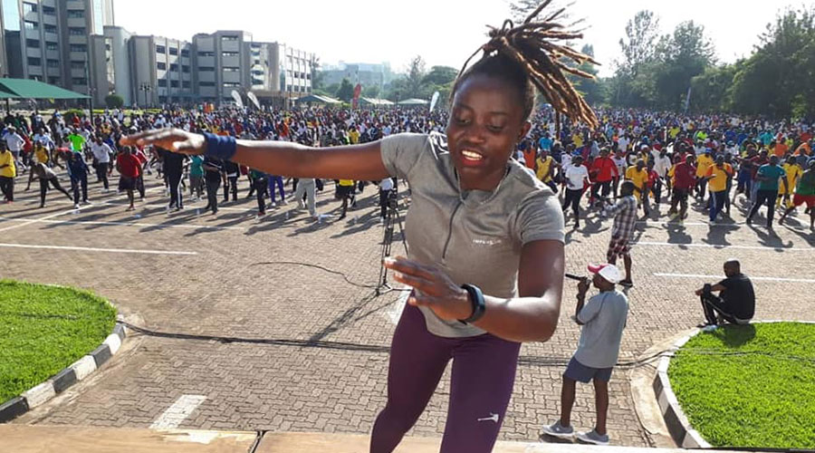 Sandrine Twagiramariya, 28, leads a public fitness session during a past car-free day. 