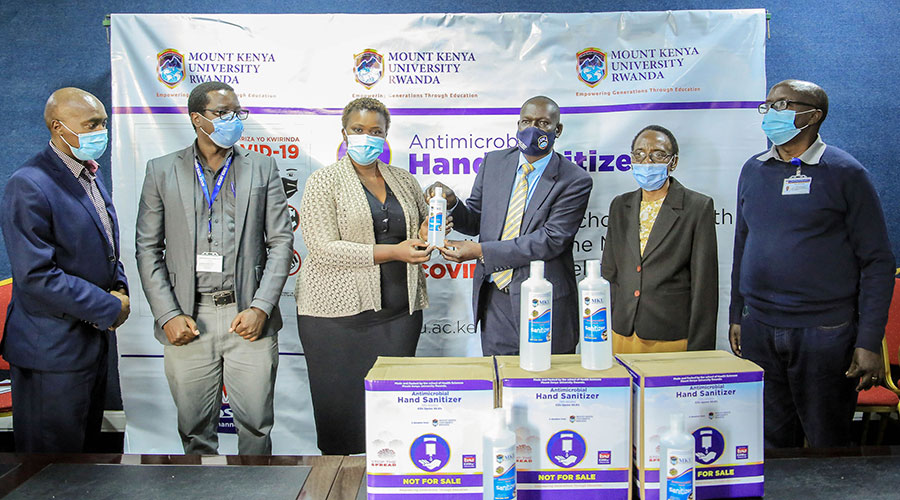 Mount Kenya University officials donate 10,000 litres of hand sanitisers to Kicukiro District on Thursday, April 22. 