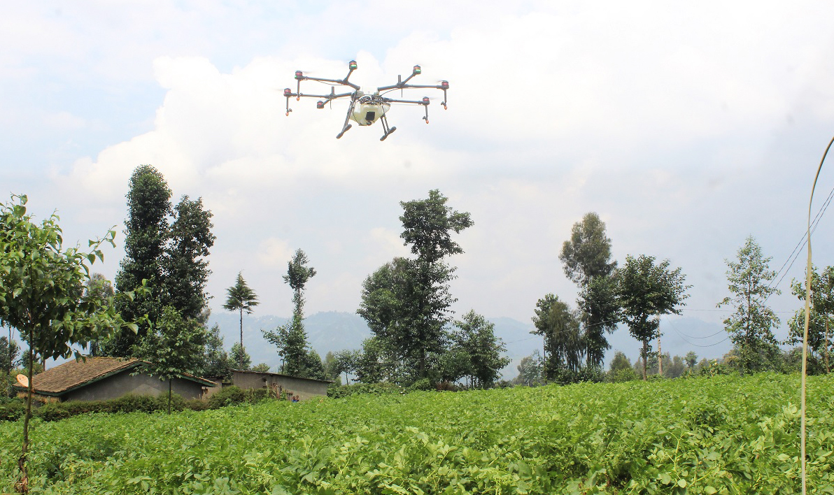 A drone sprays pesticides fighting mosquitoes that spread malaria in Musanze District in 2019. 