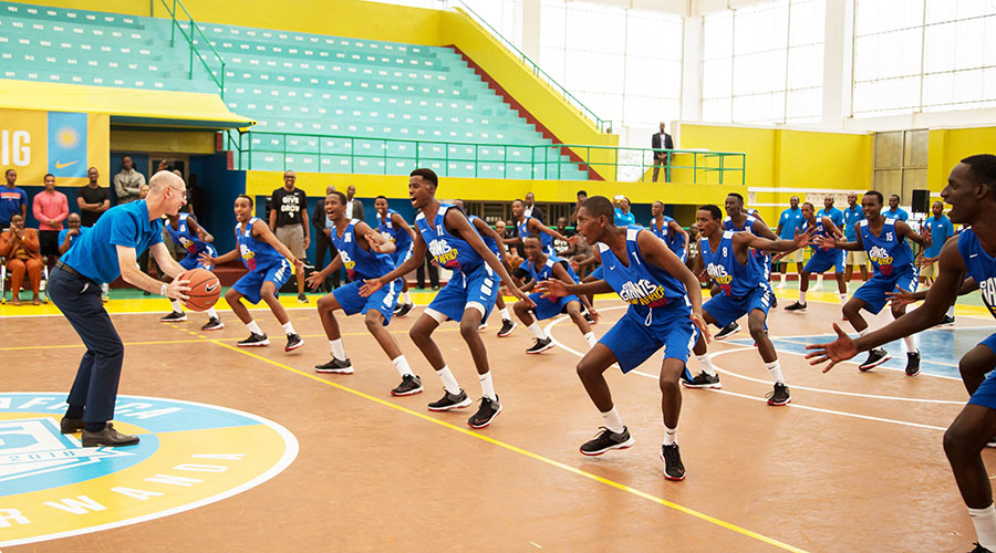A group of young basketball players undergo a talent detection exercise at Petit Stade Remera in 2018. 