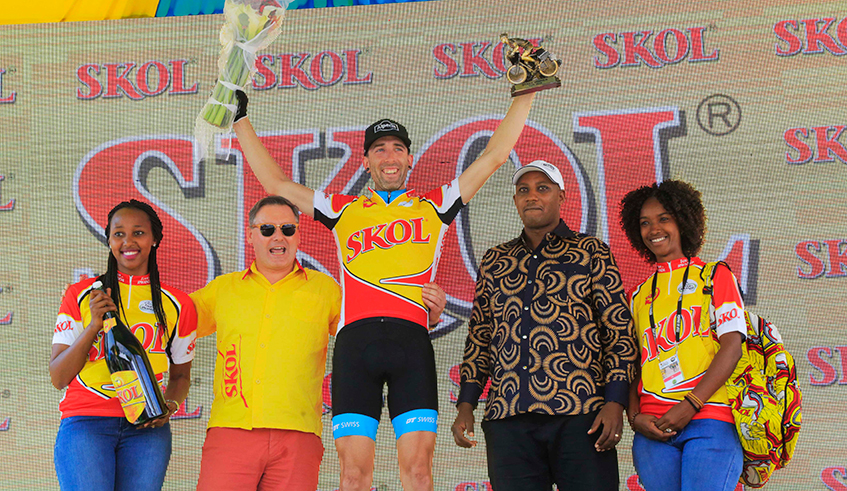 Managing Director of SKOL Breweries Limited, Ivan Wulffaert awarding  Rugg Timothy the winner of Stage 4 in Tour du Rwanda 2018.Skol terminates Rwf240m annual deal with Ferwacy . / Sam Ngendahimana