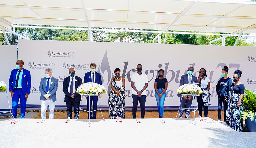 Ecole Belge de Kigali delegation observes a moment of silence in honour of the schoolu2019s nine students and staff members who were killed during the 1994 Genocide against the Tutsi at Kigali Genocide Memorial on Friday, April 30. / Photos: Dan Nsengiyumva.