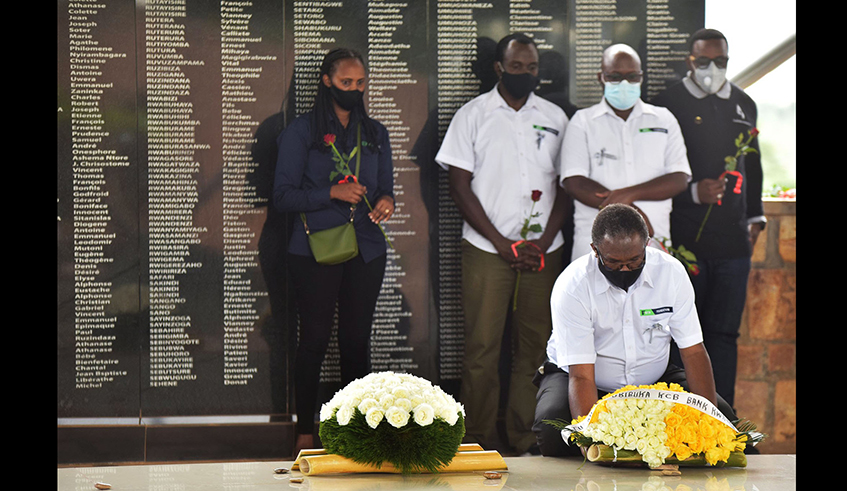 KCB Bank Rwanda Managing Director George Odhiambo leads the banku2019s employees in laying a wreath at Ntarama Genocide Memorial in Bugesera District on Friday, April 30./ Photos: Courtesy.