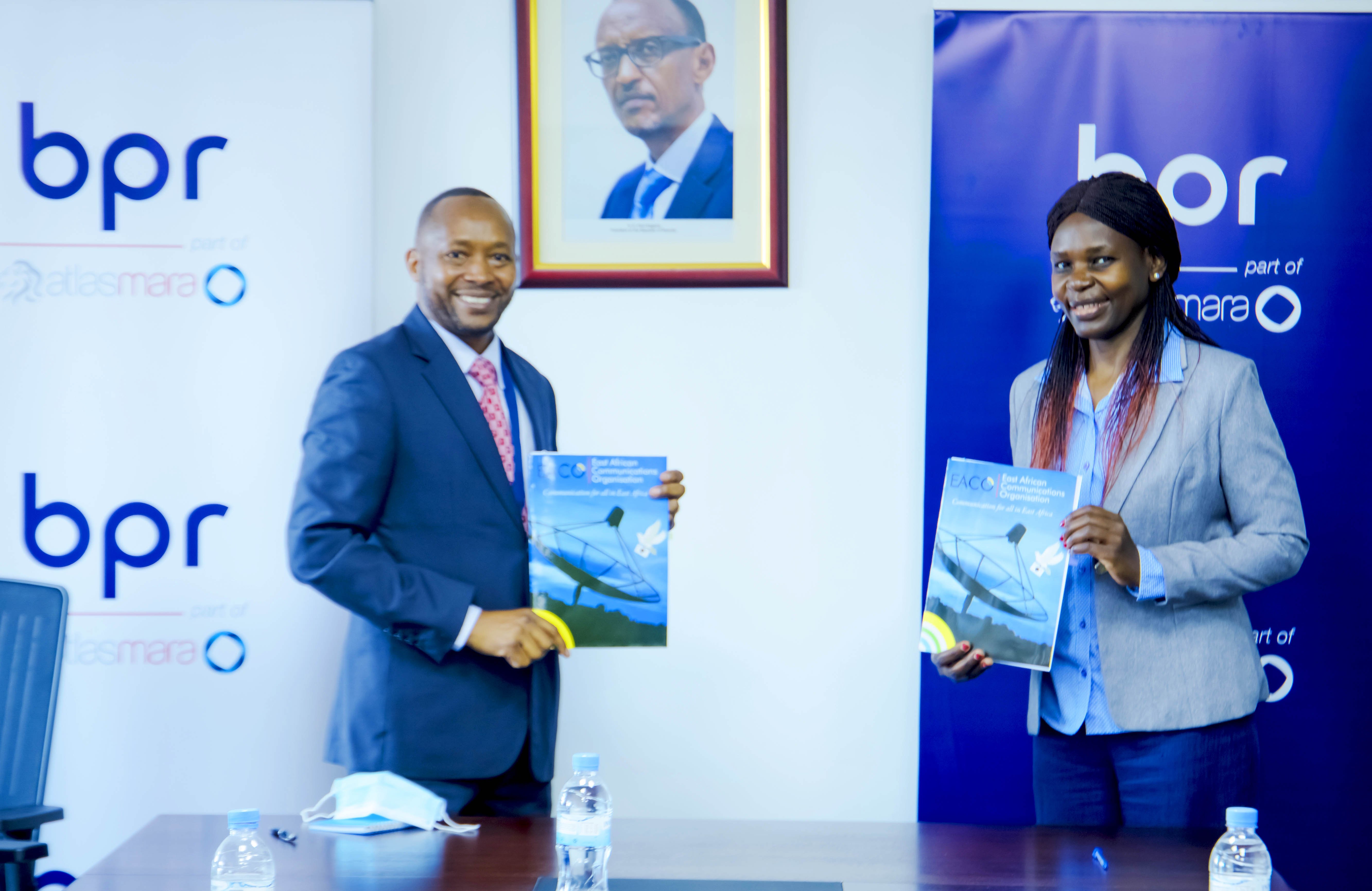 Banque Populaire du Rwanda Plc Managing Director, Maurice K. Toroitich and Dr. Nora Sitati, in charge of Human Resources and Capacity Building who signed the MOU on behalf of Ally Yahaya Simba, Executive Secretary of EACO. 