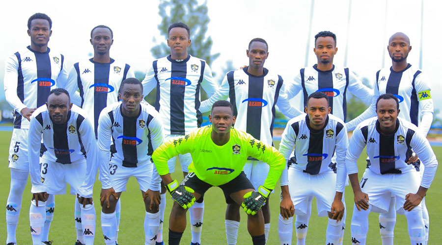 APR FC players pose for a group photo before their match against Bugesera FC. The army side qualified for the quarter finals of the Primus national league without losing any match. 