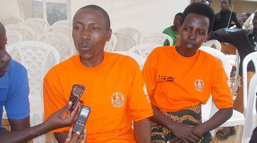Protogu00e8ne Basabose, flanked by his wife Francine Mujawamariya, speaks to the media at Mata Health Centre in Muhanga District in 2016. The couple opted for vasectomy, a permanent contraception method for men. 