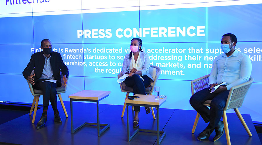 L-R: Alex Ntale, Roselyne Uwamahoro, and Angelos Munezero during the press conference at the office of FinTecHub on May 25 2021. 