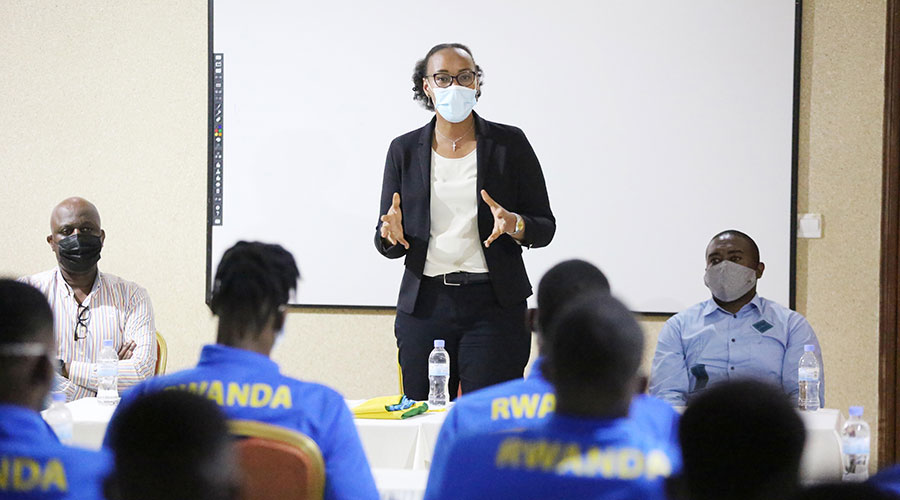 Minister of Sports Aurore Mimosa Munyagaju briefs National Basketball Team players in February. Munyagaju said Rwanda is ready to host the 2021 Afrobasket tournament in August. 