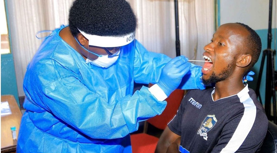 APR FC captain Thierry Manzi undergoes a Covid-19 test before a recent league match. Rwanda has been chosen as a vaccination hub for Athletes going for the Olympic games in Tokyo. 