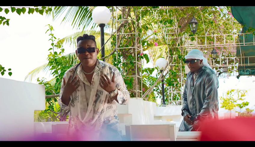 Ben Adolphe (left) last week released u2018Aba Exu2019 video, a collaboration with singer Platini (P). / Photo: Courtesy.