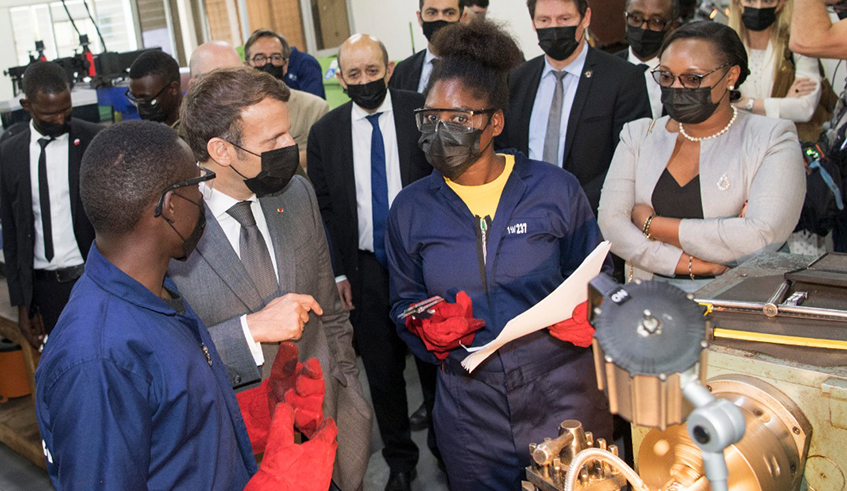French President Emmanuel Macron visiting the Mechatronics department at IPRC Tumba on May 27 . / Courtesy