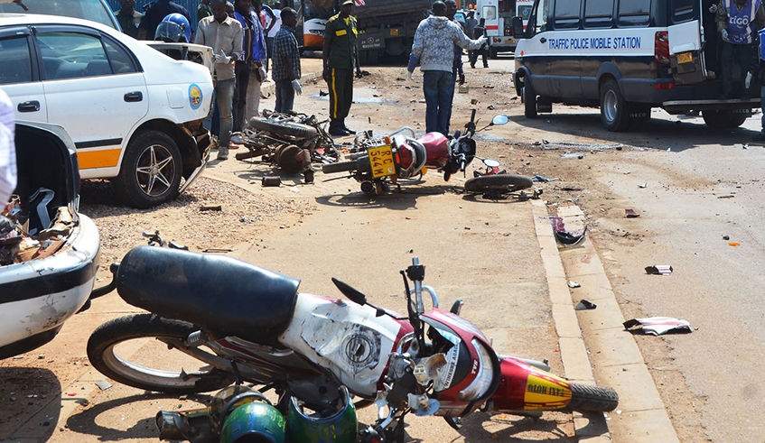 A scene of an accident in which motorcycles were crushed by a heavy truck in Kicukiro in 2016. Insurers have attributed the rise in premium costs to the fact that taxi motos are the leading causes of road accidents. / Photo: Sam Ngendahimana.