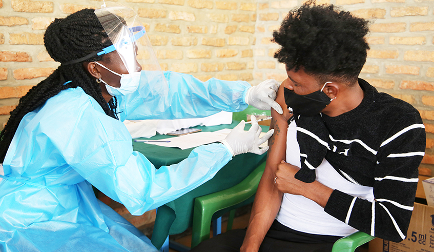 A resident undergoes the Covid 19 vaccination exercise on March 10. / Photo by Craish Bahizi.