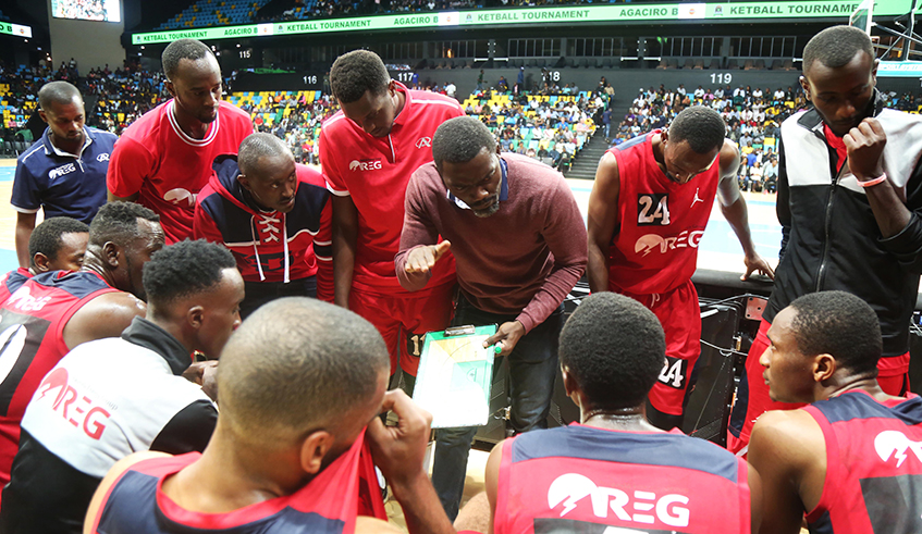 Rwanda Energy Group (REG) head coach Henry Mwinuka gives instructions to his players in a past league match. / Photo: Sam Ngendahimana.