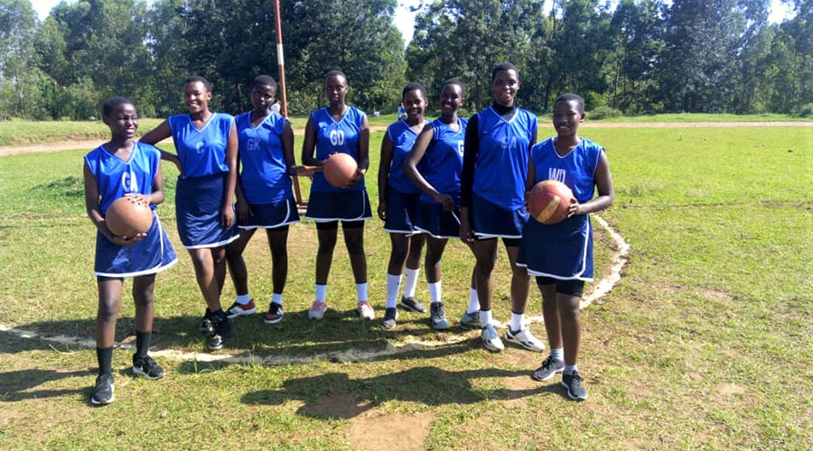 Sandrine Iradukunda (2nd-R), at 18, is one of the top prospects in domestic netball. 