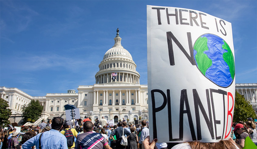 Advocates for climate action gathered in front of the U.S. Capitol during a 2019 demonstration, demanding immediate and meaningful action to reduce greenhouse gas emissions. / Net photo.