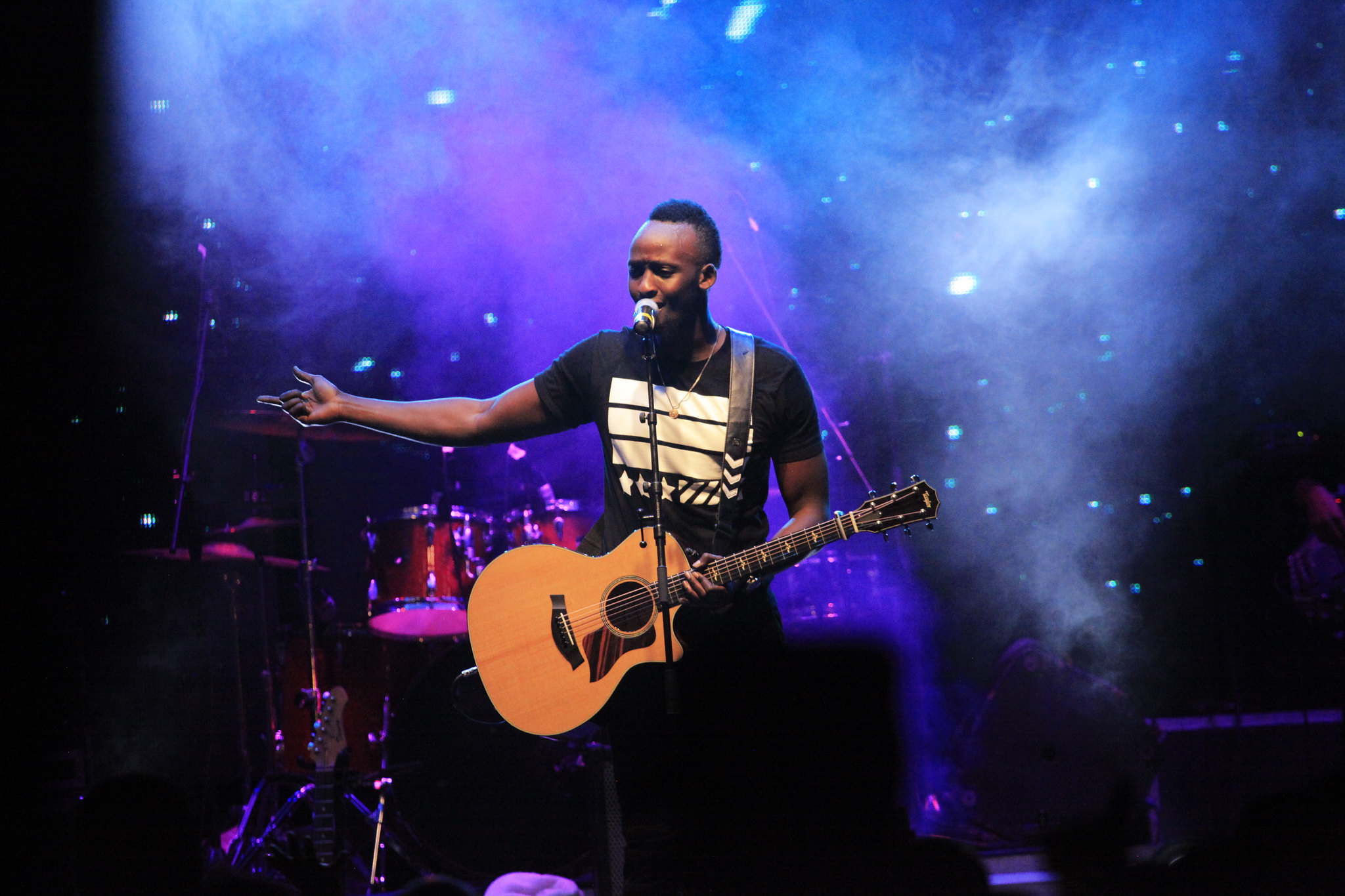 US-based Rwandan R&B singer Meddy performs during a concert in Nyamata, Bugesera District on September 2, 2017. 