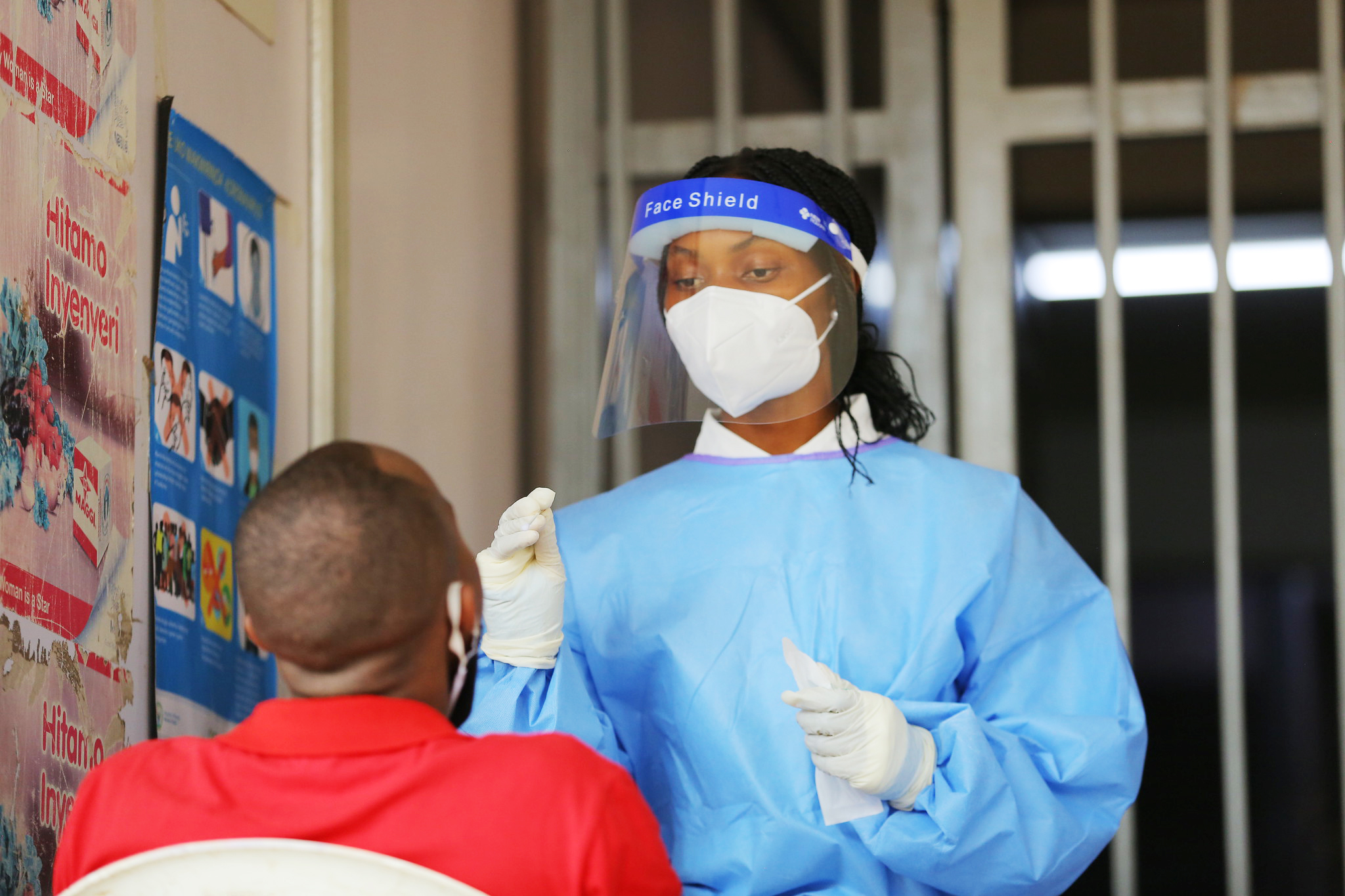 A health worker conducts COVID-19 random testing exercise at Nyabugogo. 