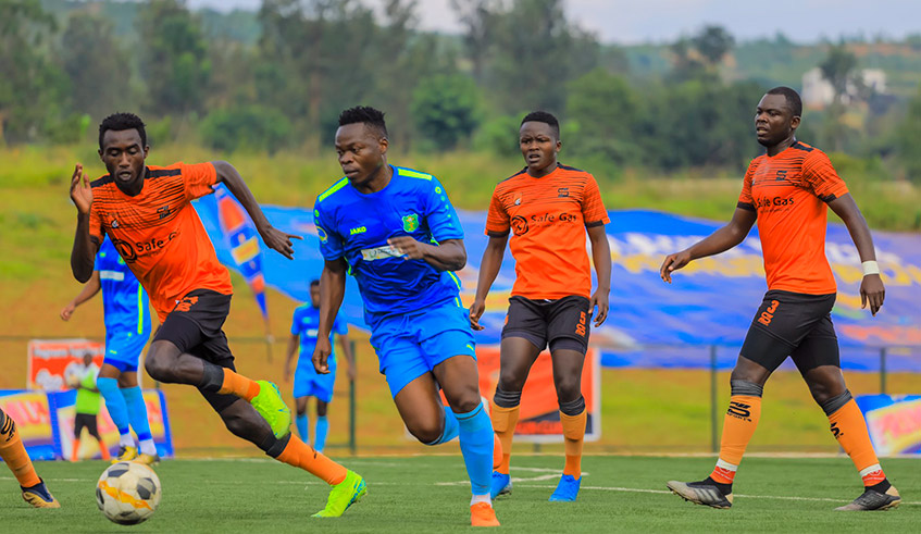AS Kigali midfielder Pierrot Kwizera dribbles past Bugesera players during a recent match. AS Kigali are level on points with APR ahead of the last round of matches of the league. 