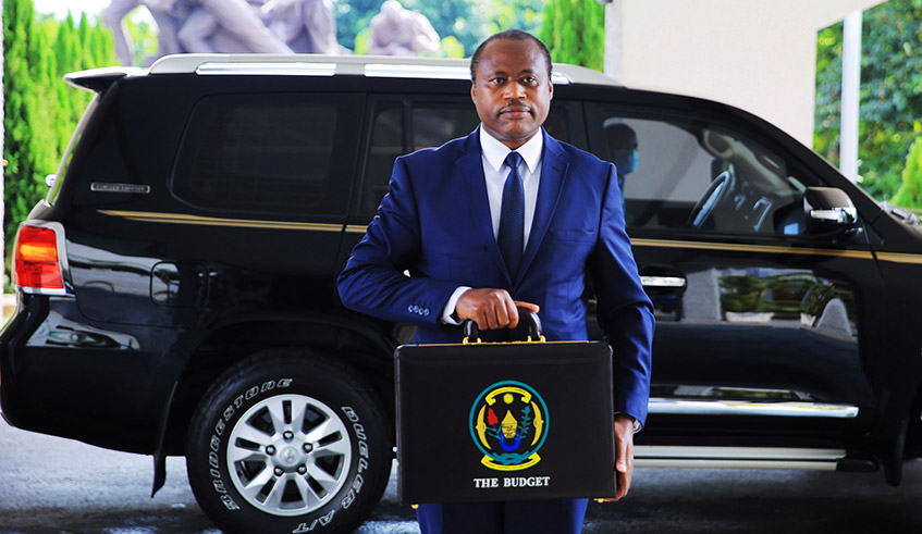 The Minister for Finance and Economic Planning Uzziel Ndagijimana arrives at the parliament to present the national budget during a previous budget reading on June 22, 2020. Due to the Covid-19 pandemic, this yearu2019s budget reading was virtual. 