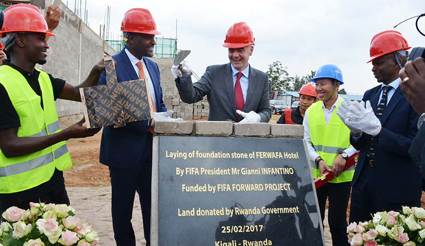 FIFA President Gianni Infantino lays the foundation stone of FERWAFA Hotel in Kigali on February 25,2017. The construction works are set to finally resume next week. / Sam Ngendahimana.