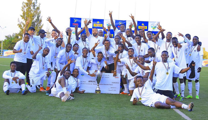APR FC players and staff celebrate after winning the national football league. The army side finished the season without losing a single match, the second time they have done it in a row. / Courtesy.