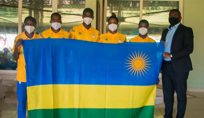 Didier Shema-Maboko, Permanent Secretary in the Ministry of Sports (extreme right) with Rwandan Athletes to the Tokyo Olympics on Monday. / Courtesy.