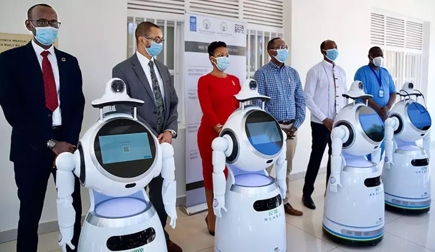 Government officials unveil five high-tech robots to support in the fight against COVID-19, last year. The Covid-19 pandemic has been a driver and an accelerator of digital innovation in the healthcare industry throughout 2020. / Photo: Gad Nshimiyimana.