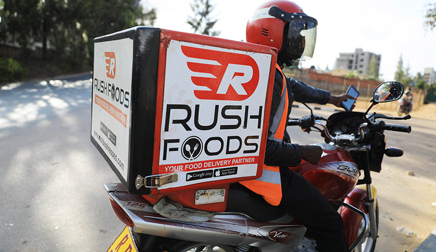 Rush Foodsu2019 motorcyclist who  delivers goods that were shopped through e-commerce in Kigali. / Photo: Sam Ngendahimana.
