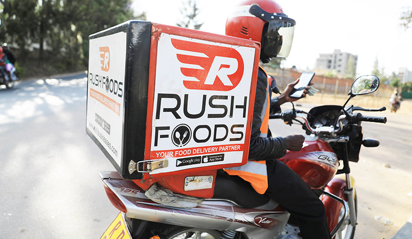 Rush Foods' moto driver  who delivers food to the clients in Kigali . / Sam Ngendahimana