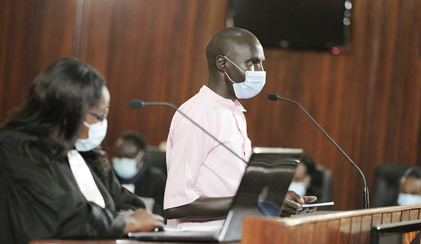 Flanked by his lawyer, terror suspect Emmanuel Shaban, one of the accused, was the first to take the floor on Thursday , July 15. / Photo: Sam Ngendahimana.