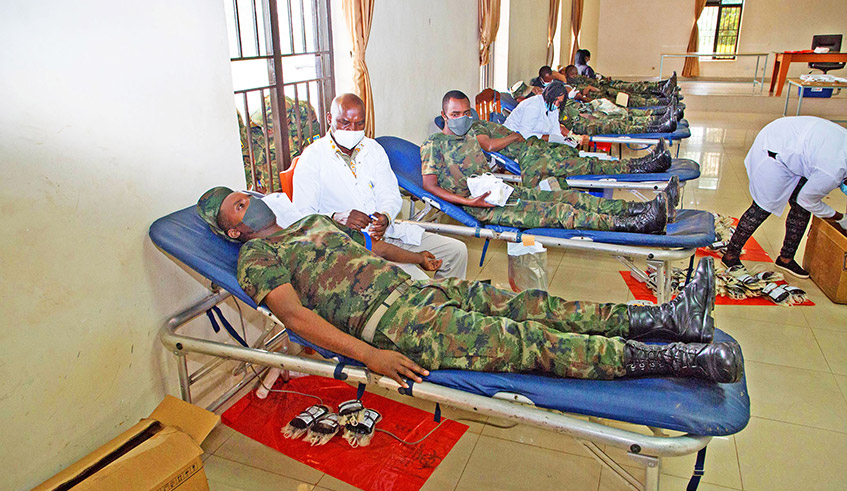 Rwanda Defence Force soldiers during a blood donation exercise in Kigali in June 2021.  Rwanda Biomedical Centre says it will rely on its partnership with the military and police to meet the national blood collection targets in the midst of tight Covid-19 measures which include lockdowns. / Photo: File. 