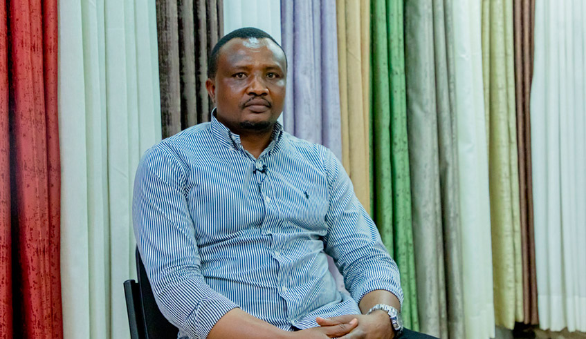 Eugu00e8ne Rukundo, a shareholder of Mario Shop Ltd that mainly deals in curtains in Kigali. 