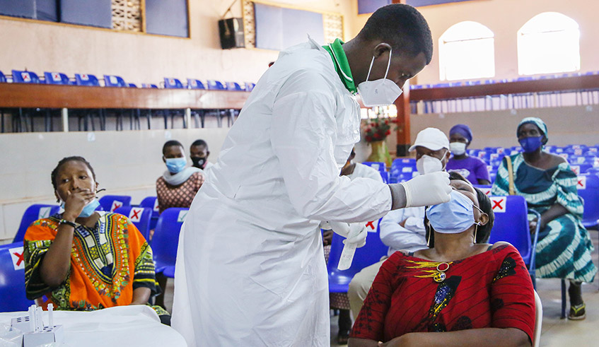 Residents undergo the covid 19 mass testing in Kigali on July 23 . / Dan Nsengiyumva