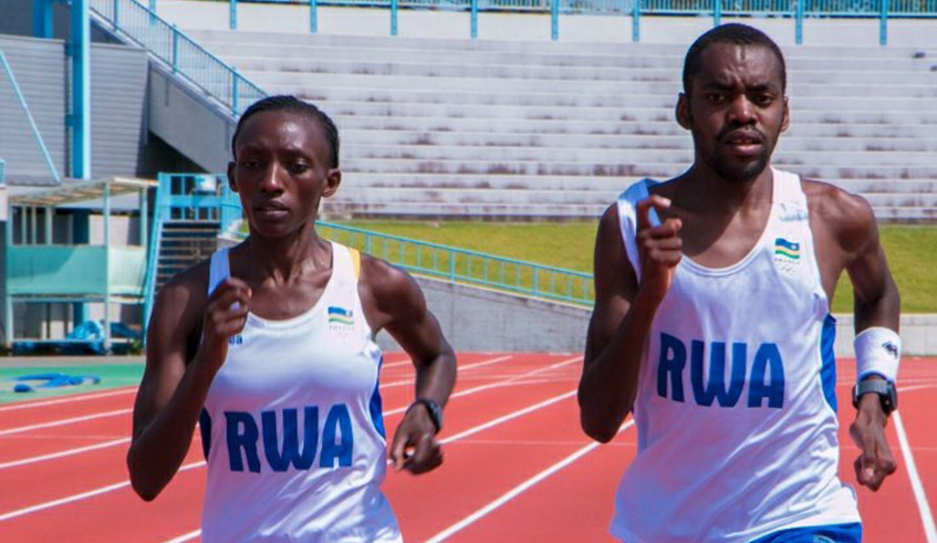 Rwandan athletes John Hakizimana and Marthe Yankurije (pictured) during a training session in Japan on July 19. No Rwandan has won a medal since the countryu2019s debut in the 1984 Olympic Games. / Courtesy.