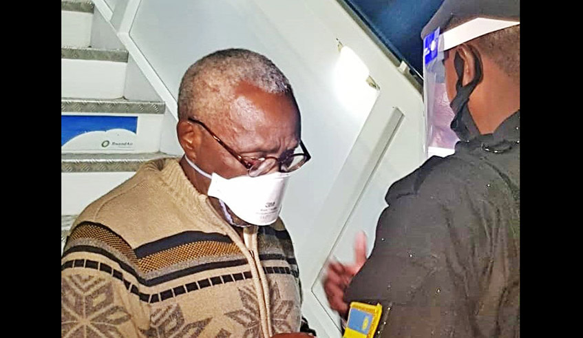 Genocide suspect Venant Rutunga, who was extradited from The Netherlands, arrives at Kigali International Airport on Monday, July 26. / Photo: Courtesy.